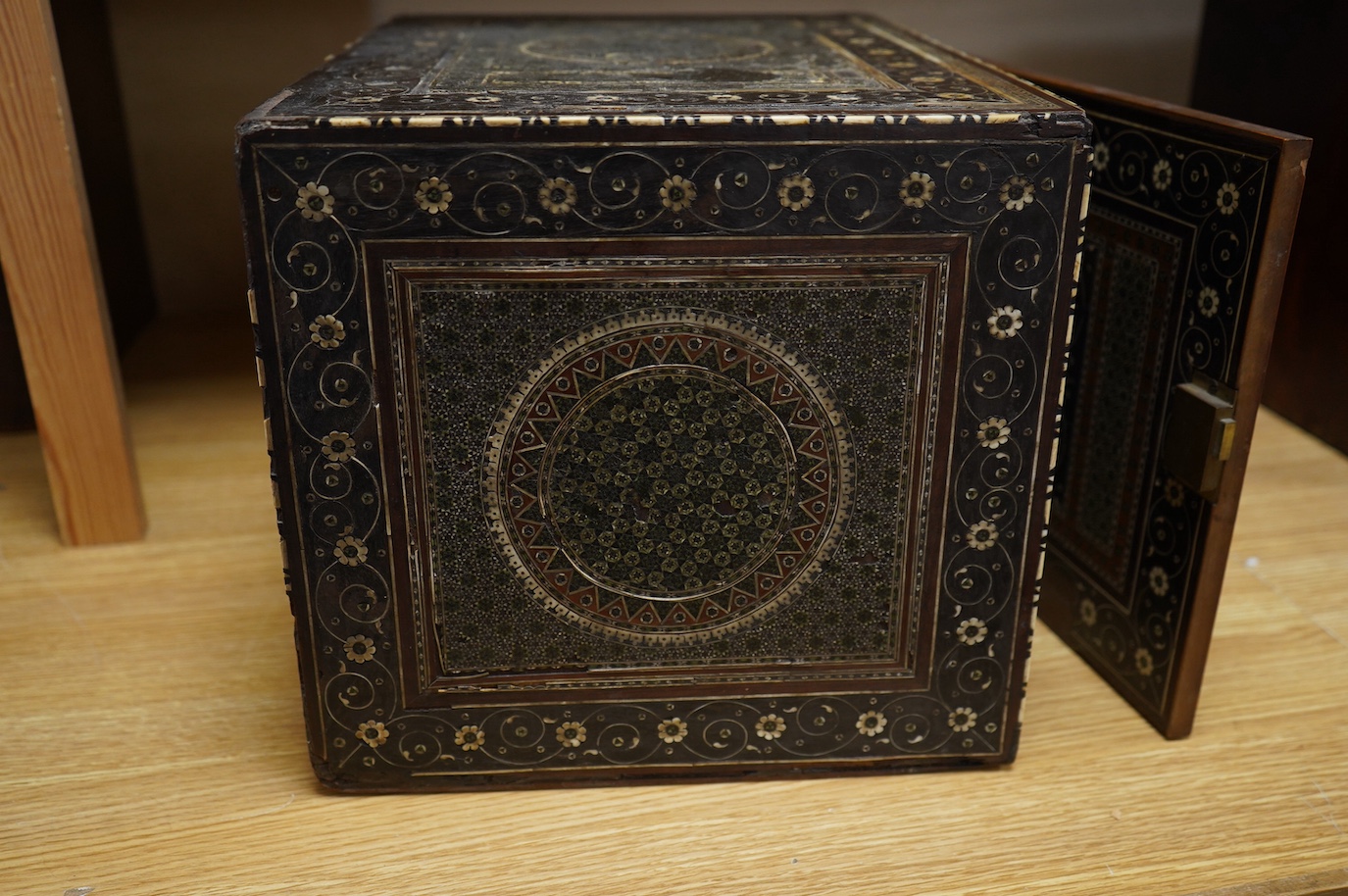 An early 17th century Indo-Portuguese ivory inlaid table cabinet, Gujarat, 29cm high. Condition - poor, losses CITES Submission reference 3XBFQXPT